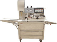 과자 생산 라인 껍질로 덮는 기계